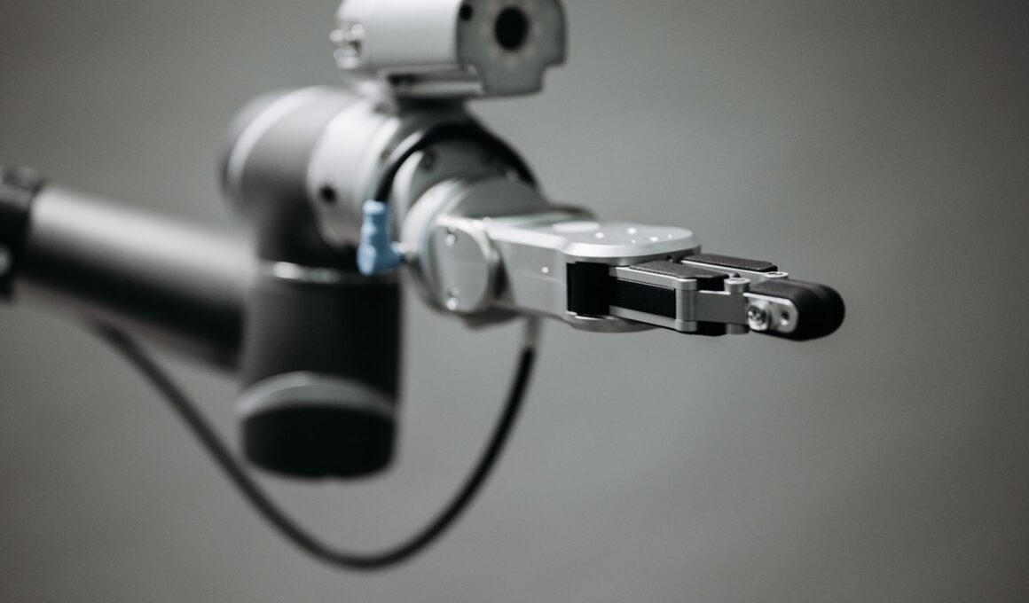Robotic arm reaching into an open toolbox of hand tools on a workbench